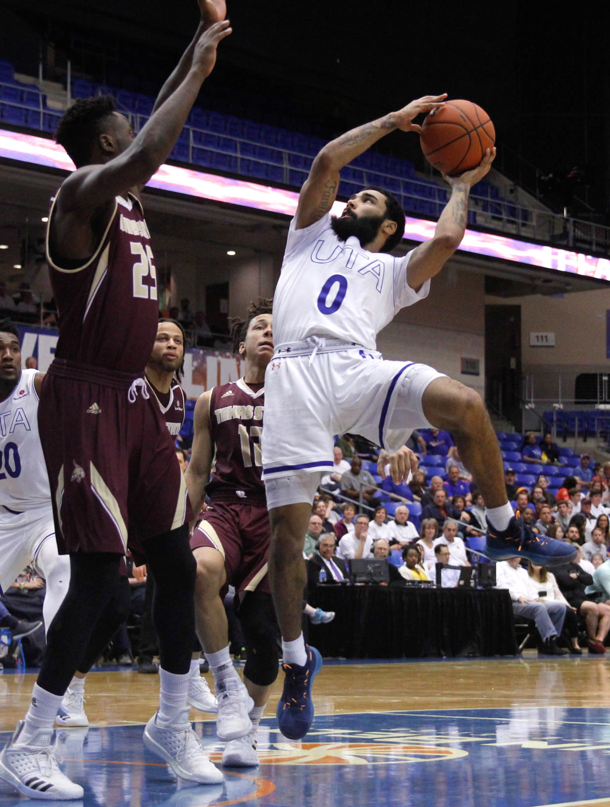 Men's basketball coach, player receive league honors